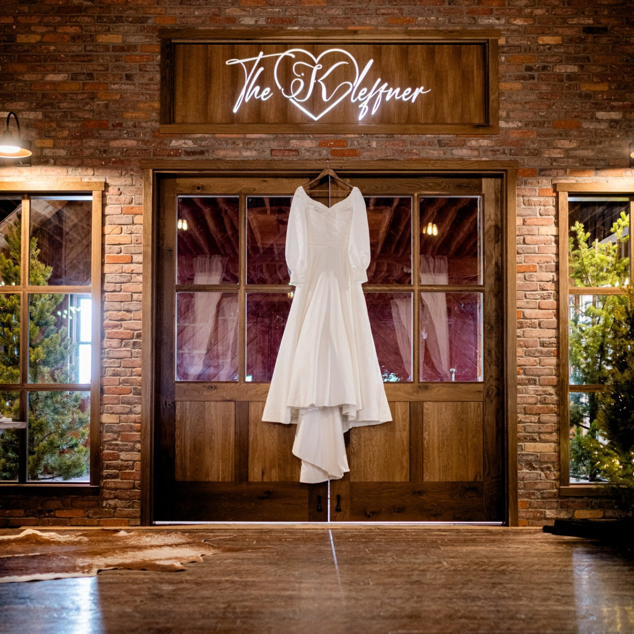 https://kleffnerranch.com/wp-content/uploads/2026/03/Wedding-Dress-in-Entryway-1-1280x1280.webp